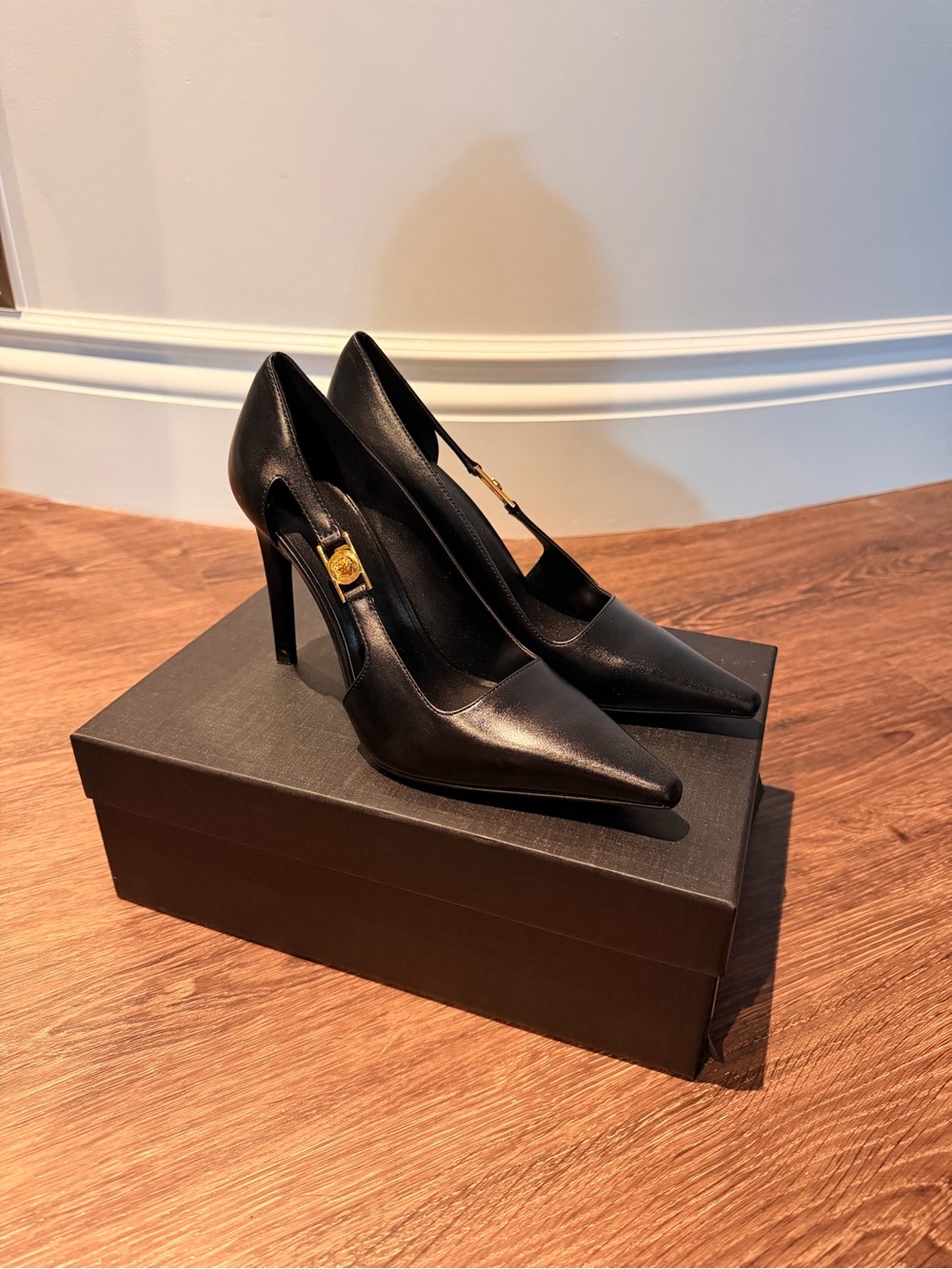 Versace Black Pointed Toe Stiletto Pumps with Gold Medusa Accent
